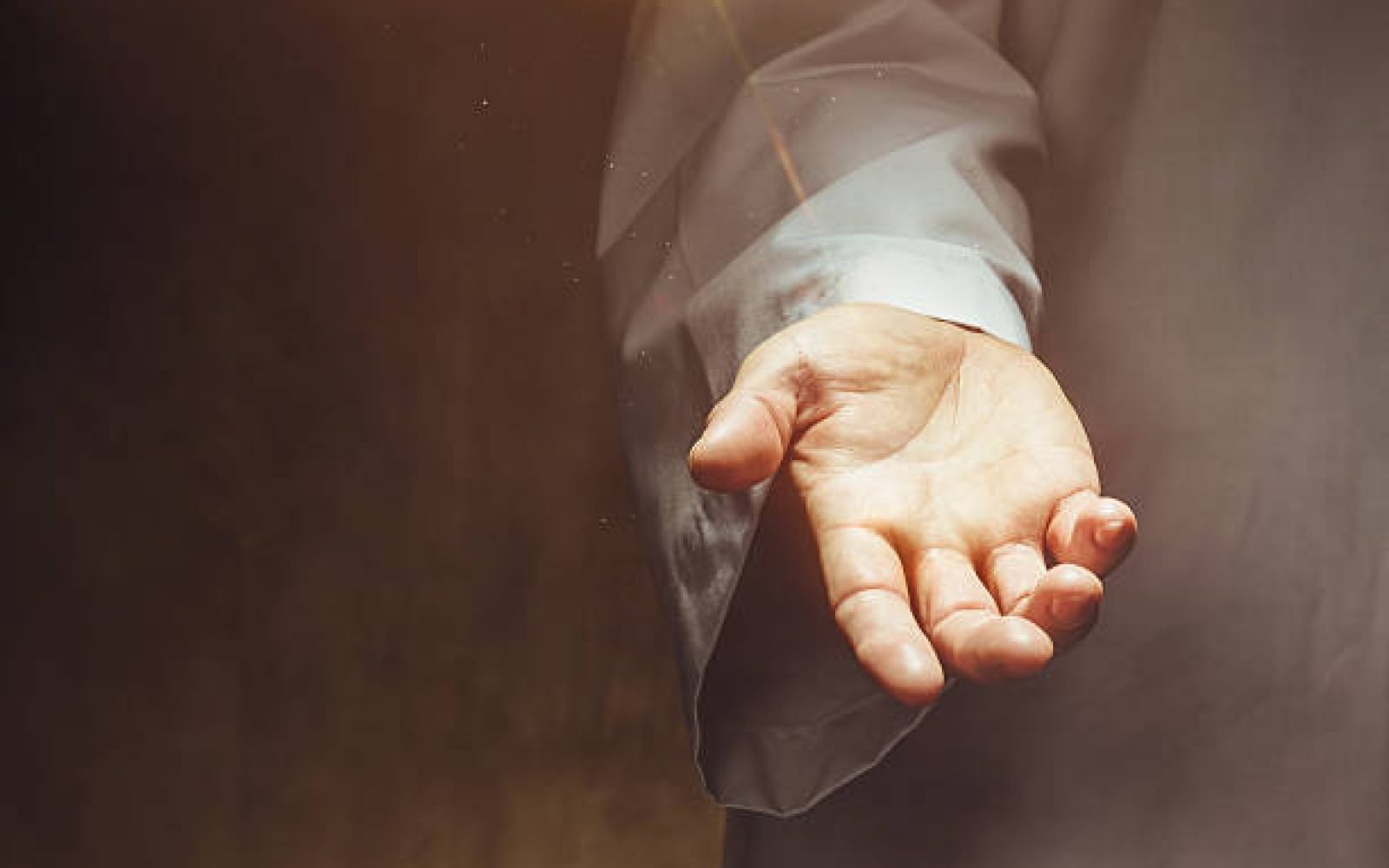 Male hand reaching out