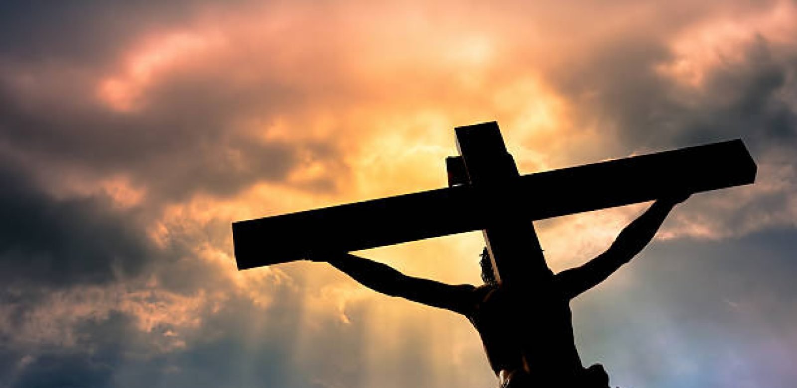 Jesus Christ Son of God over dramatic sky background religion and spirituality concept