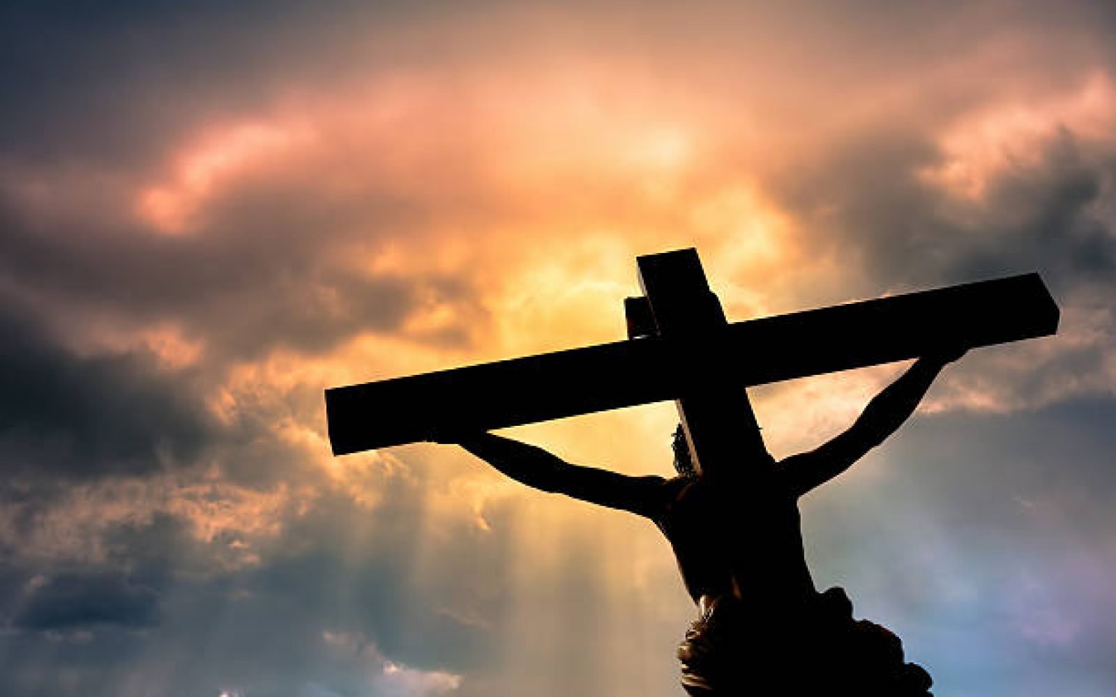 Jesus Christ Son of God over dramatic sky background religion and spirituality concept