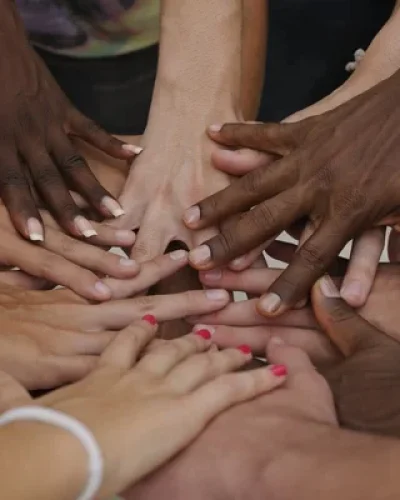 depositphotos_15549477-stock-photo-many-hands-together-group-of