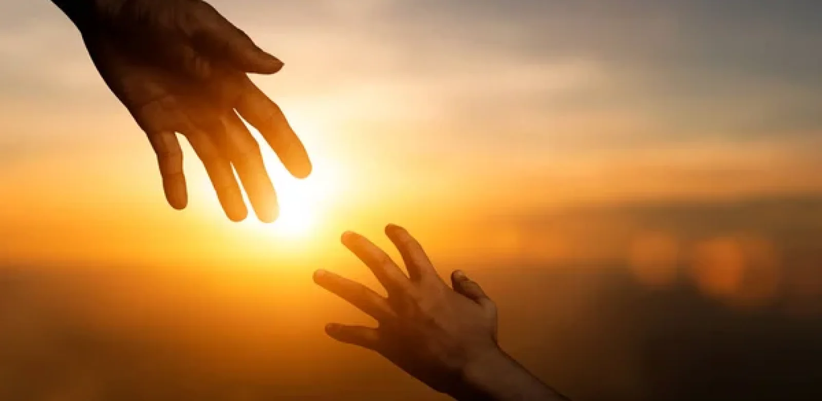 depositphotos_558279524-stock-photo-silhouette-reaching-giving-helping-hand
